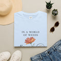T‑Shirt — "In a World of Weeds, Be a Wildflower" Floral Graphic Tee